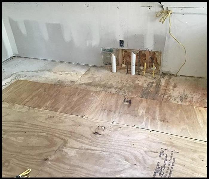 Subflooring in kitchen affected by water damage