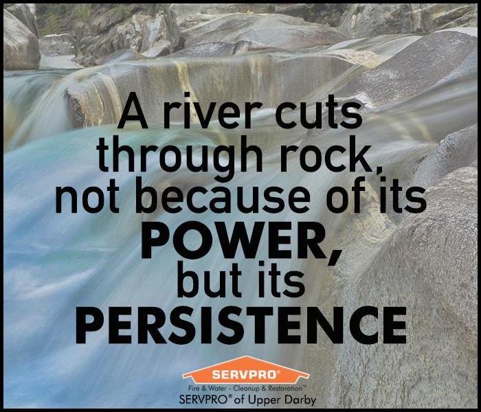 River running over rocks with text of a quote